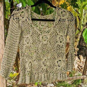 green, crocheted, long sleeved shirt